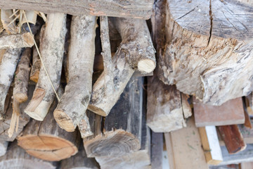  Stack of wood logs in daylight