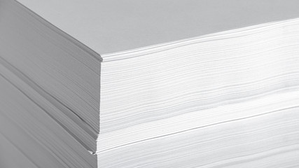 Stack of office paper, on a white background. Concept, minimalism