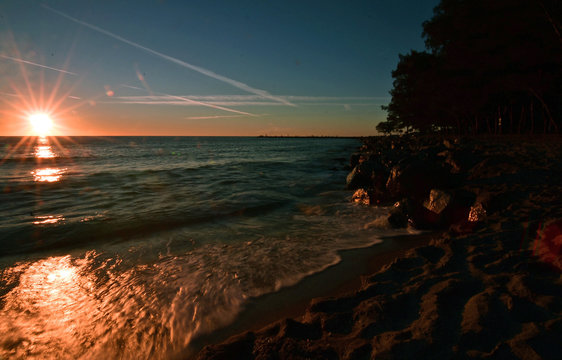 Venice rock  jetti sunset and waves