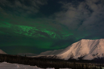 Northern lights on the background-night mountains