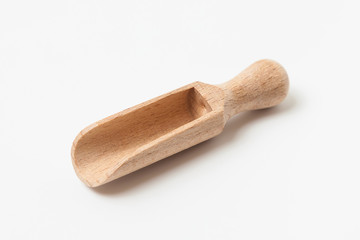 Wooden scoop isolated on a white background.
