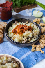 Meat substitute soy chunks with cauliflower vegan lunch food or dinner. Vegan meat with tomato paste cooked. Healthy food