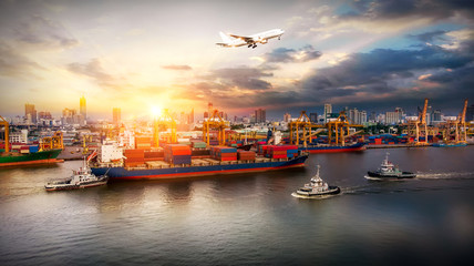 Logistics and transportation of Container Cargo ship and Cargo plane with working crane bridge in...