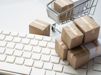 Shopping online, delivery and logistics concept,Brown paper boxs on keyboard