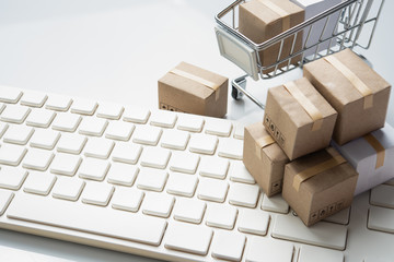 Shopping online, delivery and logistics concept,Brown paper boxs on keyboard