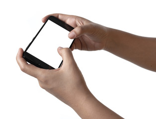 Two hands holding smart phone with blank screen in horizontal orientation and playing video games