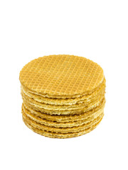 Stack of fresh homemade waffles with caramel cream isolated on a white background.
