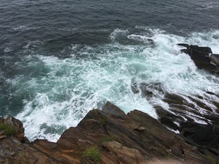 waves crashing on the rocks