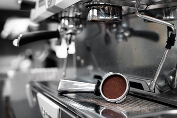 coffee tamper on coffee machine