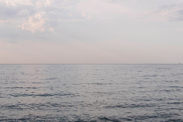Sea with clouds in cloudy weather. Infinite horizon.