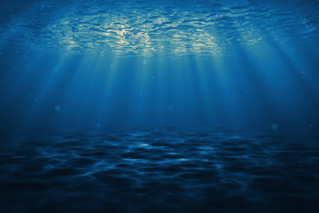 Fototapeta na wymiar Dark blue ocean surface seen from underwater. Abstract waves underwater and rays of sunlight shining through. 3D illustration