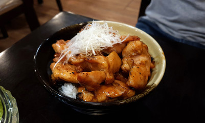 Hokkaido style grilled chicken with white Japanese rice with white onion