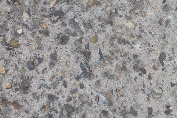 Texture of asphalt gray with stones.