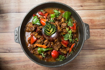 This is a very delicious food in China or Asia, it is mainly made of beer with duck meat, red pepper, green pepper, pepper, coriander, cucumber, in the pot, melting in the mouth, delicious taste