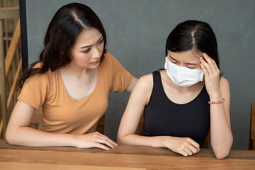women with face mask from flu infection, headache, dizziness; concept of Wuhan virus, corona virus,...