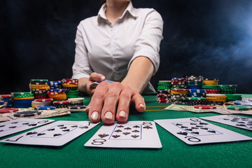 A screen saver for advertising casinos and gambling. A croupier girl or dealer distributes cards for playing poker