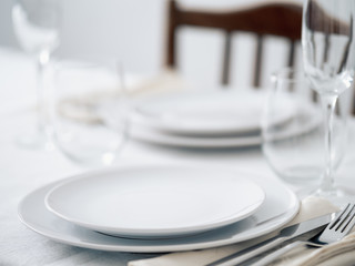 Beautiful table setting in white colors