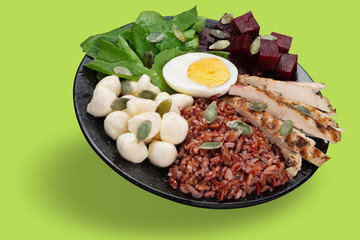 bowl with healthy diet food, healthy lifestyle concept, vegetables, kenua porridge, and mozzarella, bowl levitate