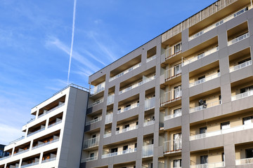 Facade of new apartment buildings in modern residential district.