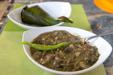 Filipino food Laing with banana leaf rice