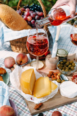 Glass of rose wine on a picnic in provence style