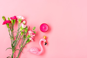 women's things - flamingo, carnation flowers, candle on pink background Flat lay Top view. Holiday card 8 March, Happy Valentine's day, Mother's day concept Mock up © bmarya83