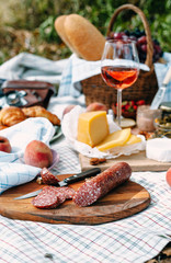 Sliced salami on a provencal style picnic