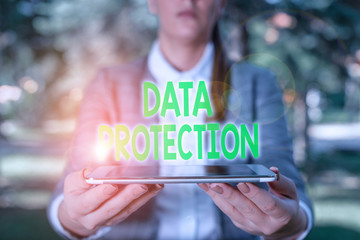 Writing note showing Data Protection. Business concept for legal control over access and use of...