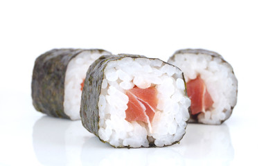 Rolled up sushi on a white background