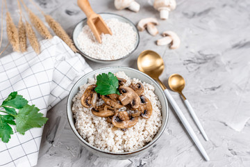 Pearl barley porridge with mushrooms, healthy food concept, breakfast