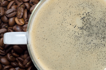 Cup of Coffee with Coffee Beans.