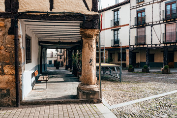Naklejka premium Arcade in the old medieval town of Covarrubias in Burgos, Castile and Leon, Spain