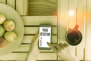 Conceptual hand writing showing Fraud Detection. Concept meaning identification of actual or...