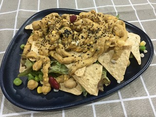 Nacho with avocado dips with seed salad 