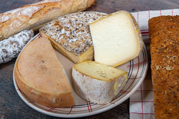 cheeses, sausage and Tomme de Savoie, Savoy, french Alps France.