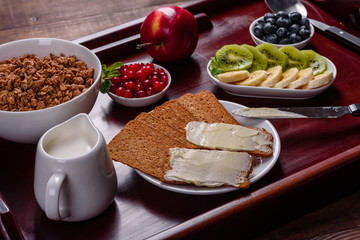 Delicious breakfast with fresh croissants and ripe berries