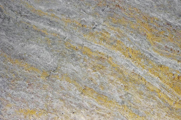 Onyx texture of natural stone, gray background. Surface of the marble with gray tint. Gray marble stone background pattern or texture. High resolution photo.