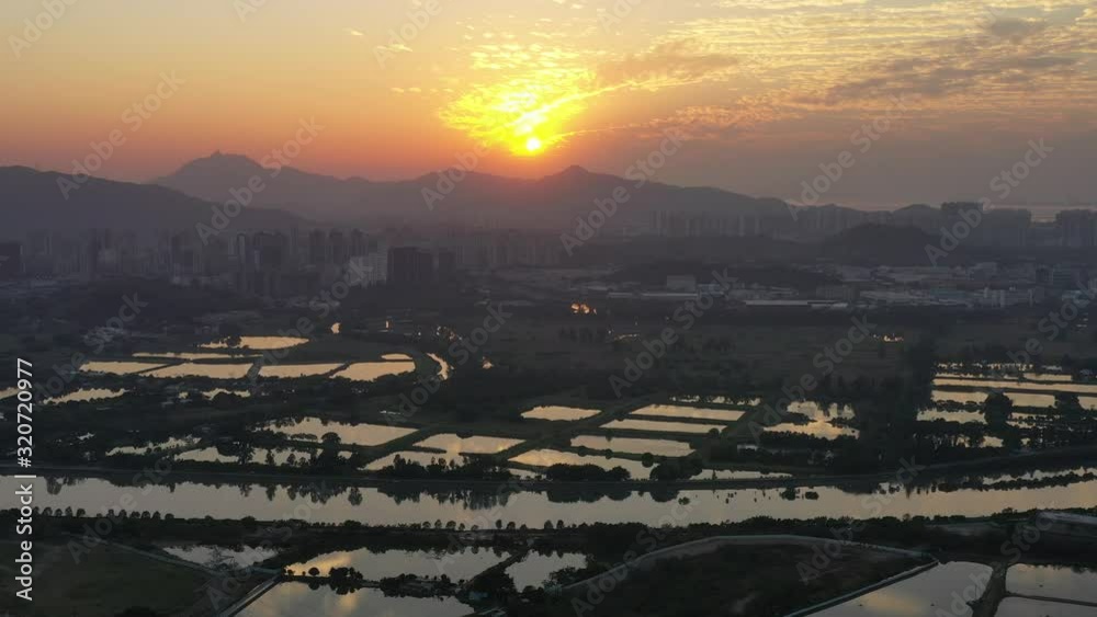 Poster Aerial View of rural green fields in Hong Kong border and skylines in Shenzhen, China