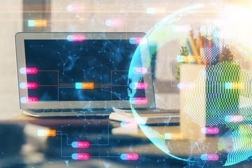 Multi exposure of table with computer and world map hologram. International data network concept.