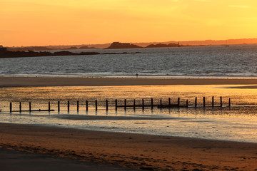 Beauty sunset view from beach in Saint Malo,  Brittany, France