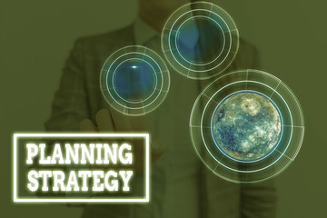 Conceptual hand writing showing Planning Strategy. Concept meaning systematic process of...