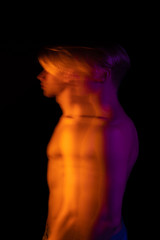 mystical portrait profile of a young guy with a naked torso. Long exposure. Ghost. abstract...