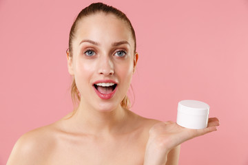 Close up blonde half naked woman 20s perfect skin nude makeup blue eyes isolated on pastel pink...