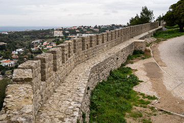 Defensive walls on the Sesimbra Castle in Portugal, overlooking the city © MelissaMN