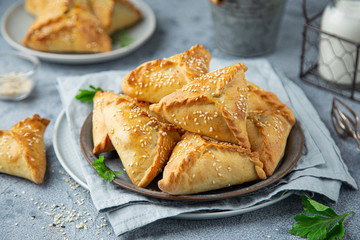 Fresh baked homemade pasties with meat and vegetables