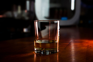 Whiskey Served in a Bar On a Rustic Wooden Surface