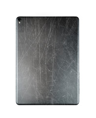Scratched back side of tablet isolated on white background