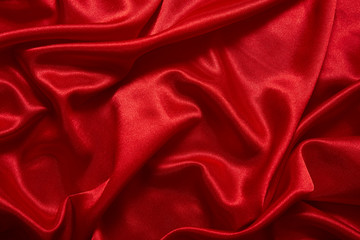 Luxury red satin smooth fabric background for celebration, ceremony, event invitation card or advertising poster