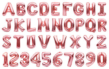English alphabet and numbers made of pink golden inflatable helium balloons isolated on white. Rose...