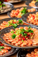 Delicious chinese food poached shrimp,ingredients are coriander and garlic with chili.